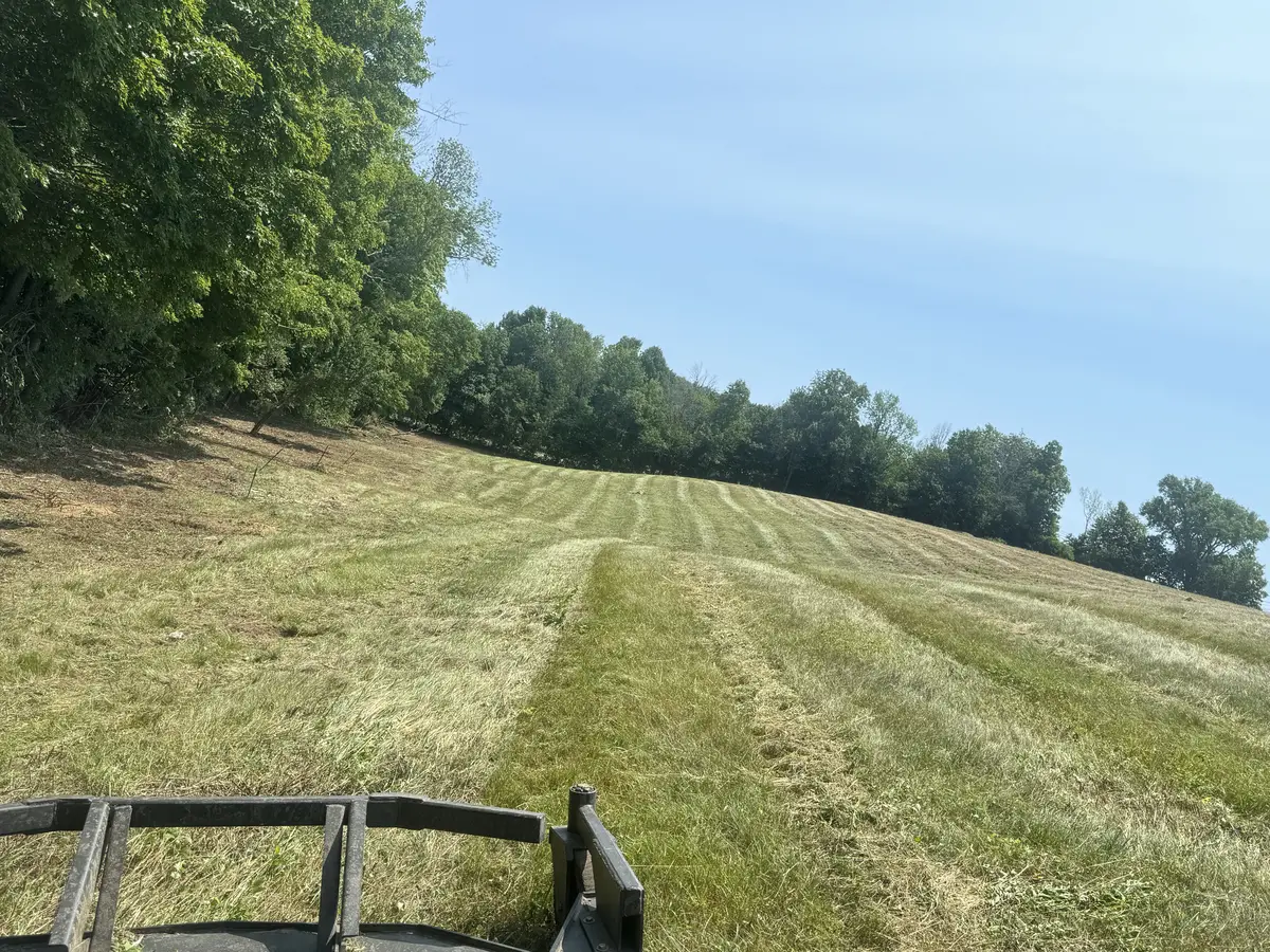 Mowed and cleared field around a finished earthwork project